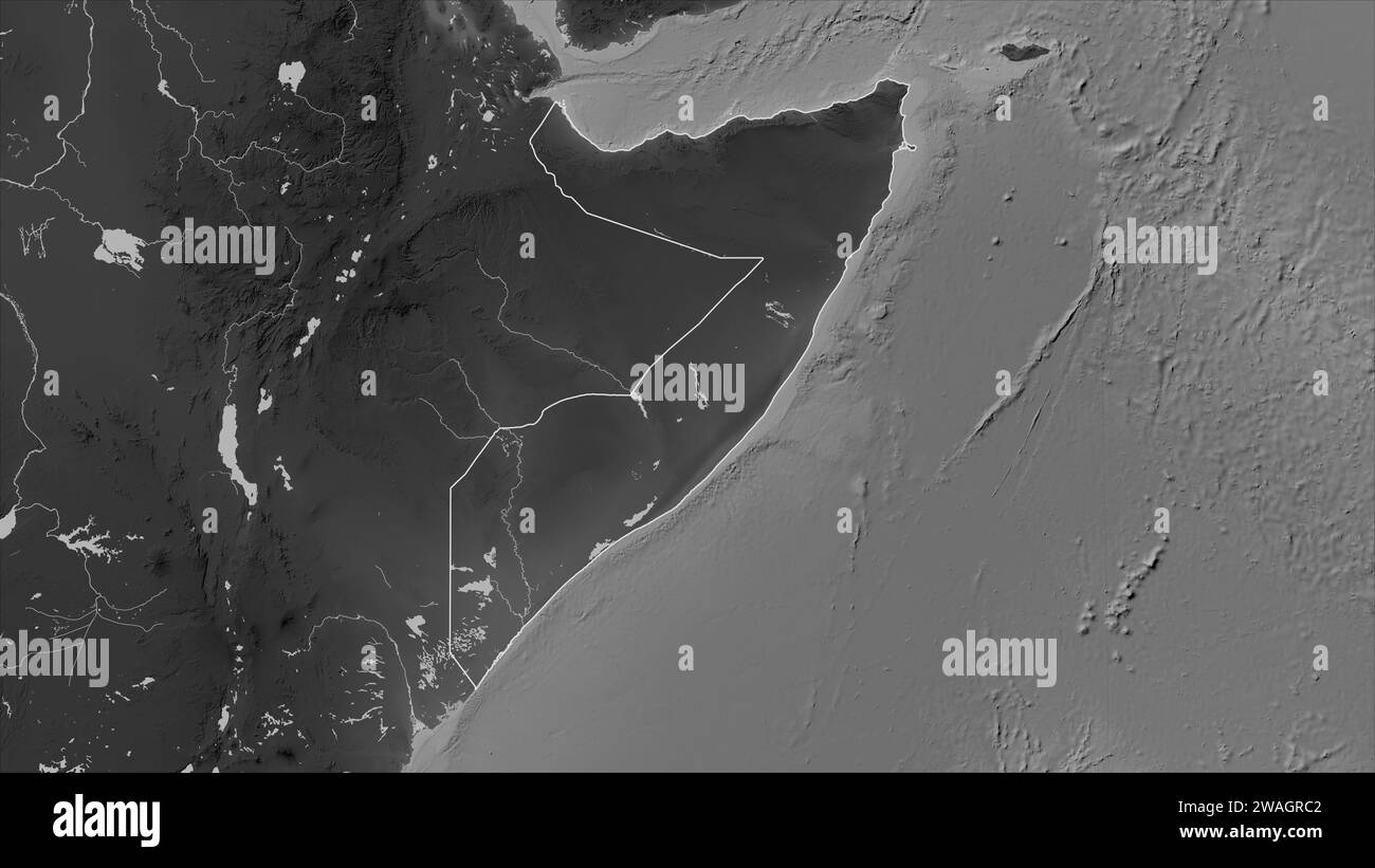 La Somalia delineata su una mappa di elevazione in scala di grigi con laghi e fiumi Foto Stock La Somalia delineata su una mappa di elevazione in scala di grigi con laghi e fiumi Foto Stock
