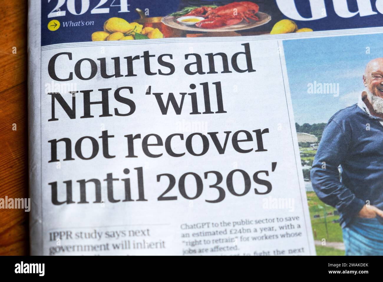 "Courts and NHS 'Will Recover until 2030s' Guardian Newspaper front page headline IPPR Public Services article 30 December 2023 London England UK Foto Stock
