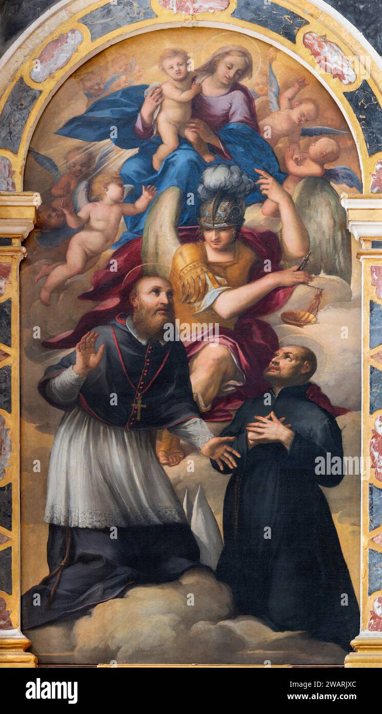 VICENZA, ITALIA - 7 NOVEMBRE 2023: Il dipinto Madonna con San Michael, St. Giulian e St. Francesco di Sales nella chiesa di San Giuliano Foto Stock