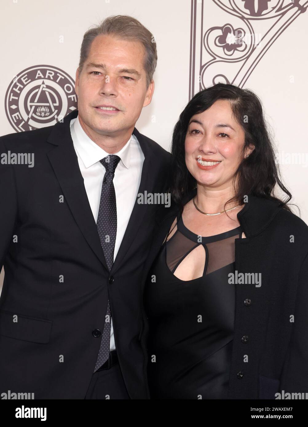 Los Angeles, CA. 6 gennaio 2024. Shepard Fairey, Amanda Fairey all'Art of ElysiumÕs 2024 Heaven Gala al Wiltern Theater di Los Angeles, California, il 6 gennaio 2024. Crediti: Faye Sadou/Media Punch/Alamy Live News Foto Stock