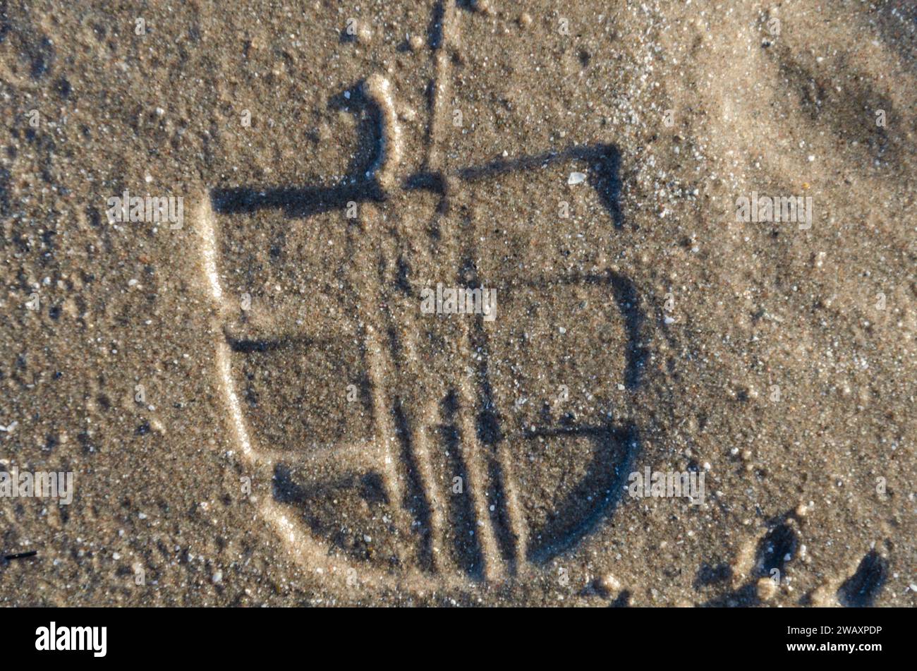 Stampa tacco sulla sabbia sulla spiaggia di Ballywalter Foto Stock