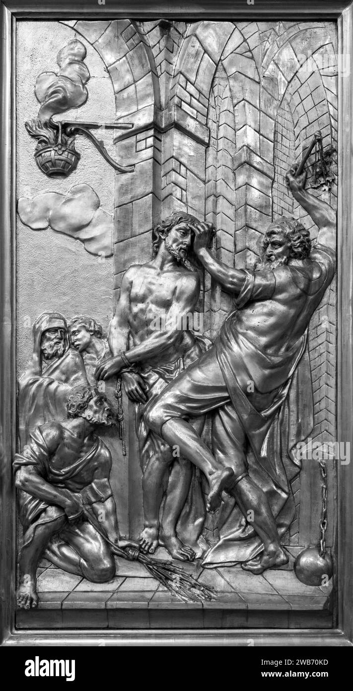 The Scourging of Jesus at the Pillar – una scultura di rilievo. Chiesa di San Giles (Kirche St Ägyd) a Gumpendorf, Vienna. Foto Stock