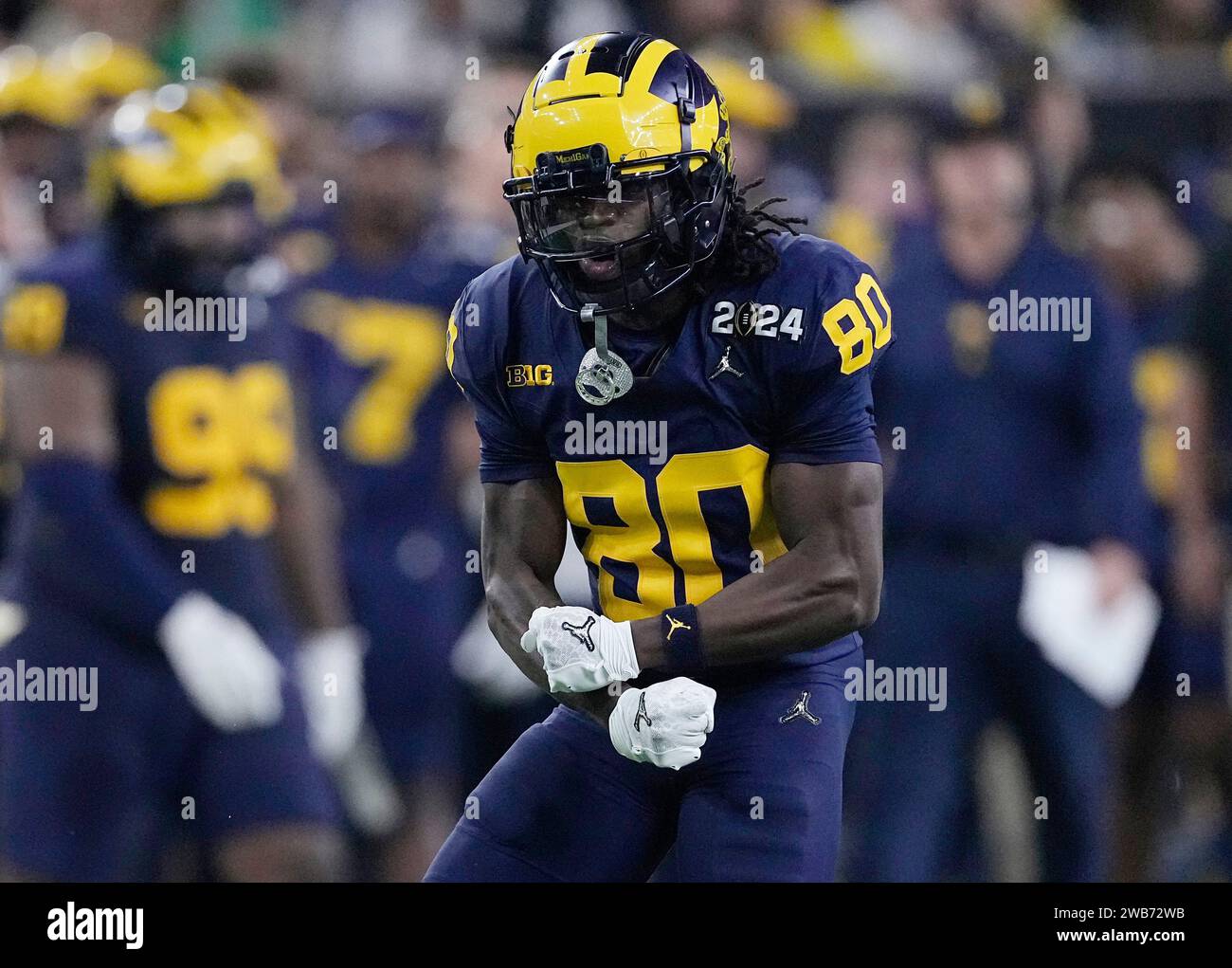 Houston, Stati Uniti. 8 gennaio 2024. Michigan Wolverines Peyton o'Leary festeggia dopo aver fatto un tackle su un ritorno di punt contro i Washington Huskies nel quarto periodo durante il College Football Playoff National Championship 2024 al NRG Stadium di Houston, Texas, lunedì 8 gennaio 2024. Foto di Kevin M. Cox/UPI Credit: UPI/Alamy Live News Foto Stock