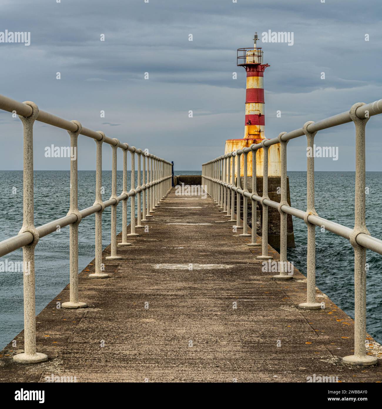 Amble Pier e Harbour Light Foto Stock
