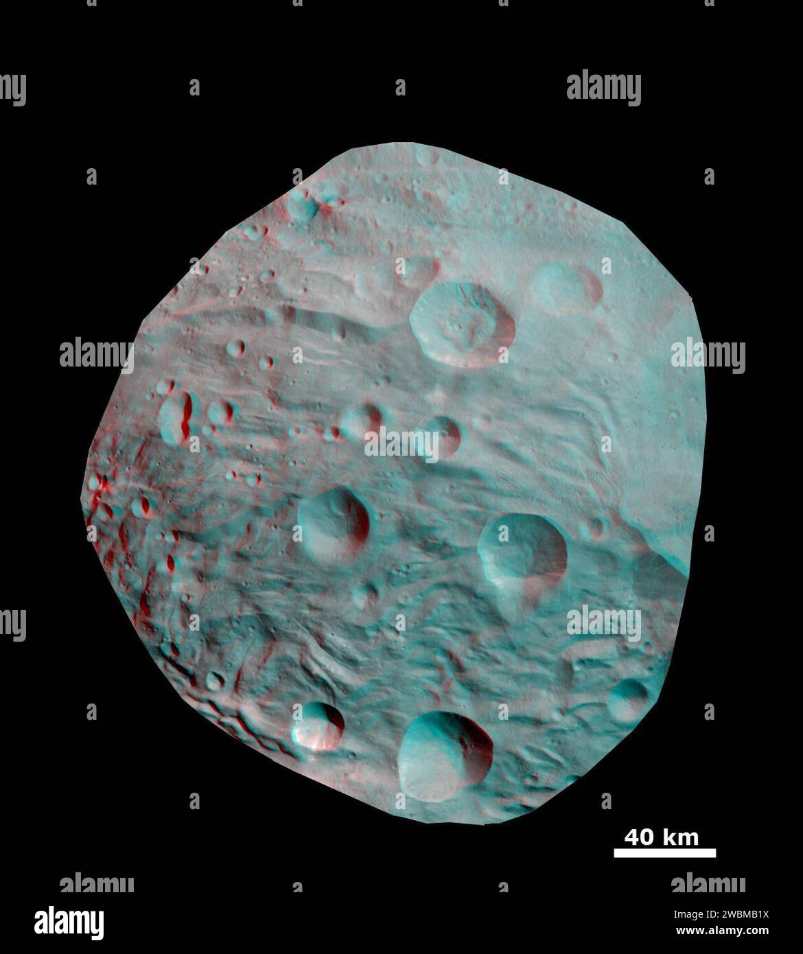 Un'immagine 3D della sonda spaziale Dawn della NASA mostra i crateri e le scanalature della regione polare meridionale dell'asteroide Vesta, catturati dalla telecamera inquadratrice il 23 e il 28 agosto 2011. Foto Stock