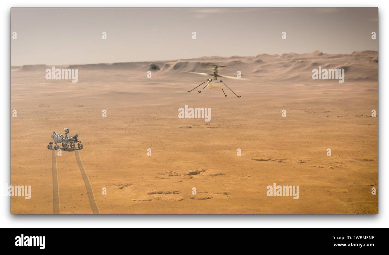 Quando l'Ingenuity Mars Helicopter della NASA tenterà il suo primo volo di prova sul pianeta Rosso, il rover Mars 2020 Perseverance dell'agenzia sarà vicino, come si vede nel concetto di questo artista. L'ingegno, un esperimento tecnologico, sarà il primo aereo a tentare un volo controllato su un altro pianeta. Quando tenterà i suoi voli di prova su Marte nella primavera del 2021, Ingenuity rimarrà entro un raggio di perseveranza di 0,6 miglia (1 chilometro) in modo da poter comunicare in modalità wireless con il rover. La perseveranza comunica poi con orbiter di relè intorno a Marte che inviano il segnale alla Terra. Foto Stock