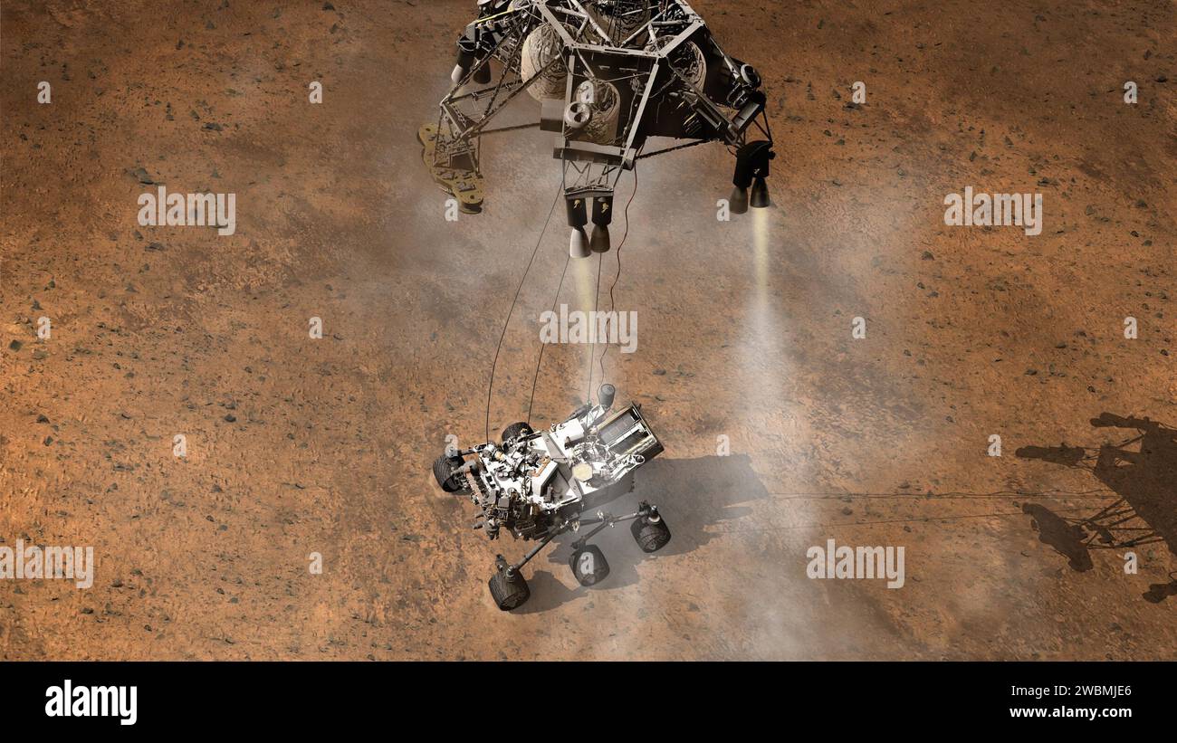 Il concetto di questo artista raffigura il momento immediatamente dopo che il rover Curiosity della NASA tocca la superficie marziana. La navicella spaziale ha rilevato un touchdown, e le taglierine pirotecniche hanno interrotto le connessioni tra il rover e lo stadio di discesa della navicella. Foto Stock