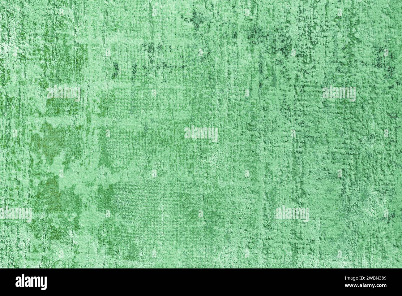 Consistenza di un tappeto verde naturale con motivo astratto, primo piano. Moquette moderna, fondo in tessuto, design, moquette, design degli interni Foto Stock