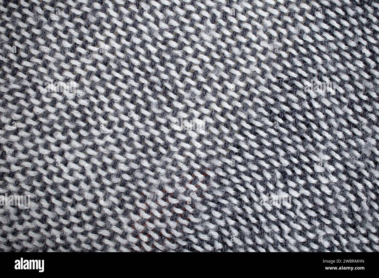Texture morbida di coperta grigia con linee e puntini, texture astratta Foto Stock