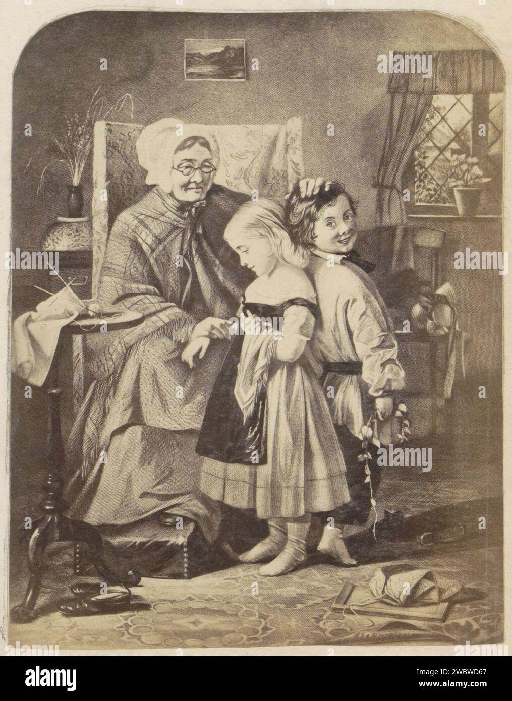 Produzione fotografica di (presumibilmente) una stampa con una nonna che misura due bambini, c. 1850 - c. 1870 Fotografia parte di album con foto di luoghi e paesaggi in Inghilterra e di arte. Giornale inglese. gli albumi di supporto fotografico stampano i nonni con i nipoti (gruppo di famiglia). interno della casa Foto Stock