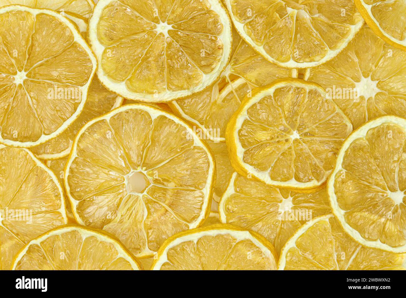 Fette di limone secche frutta disidratata consistenza completa dello sfondo Foto Stock