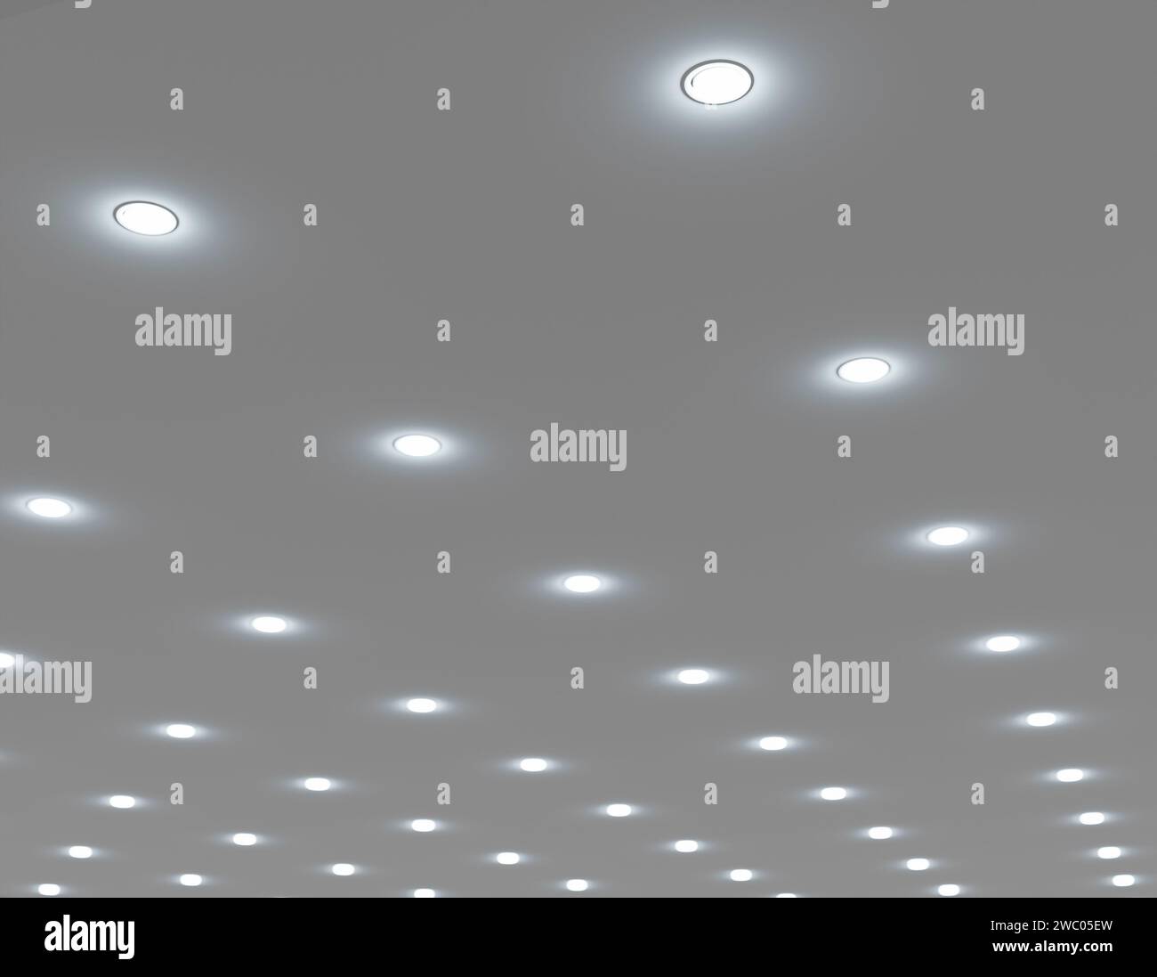 Plafoniera incassata in un soffitto bianco stretch. Foto Stock