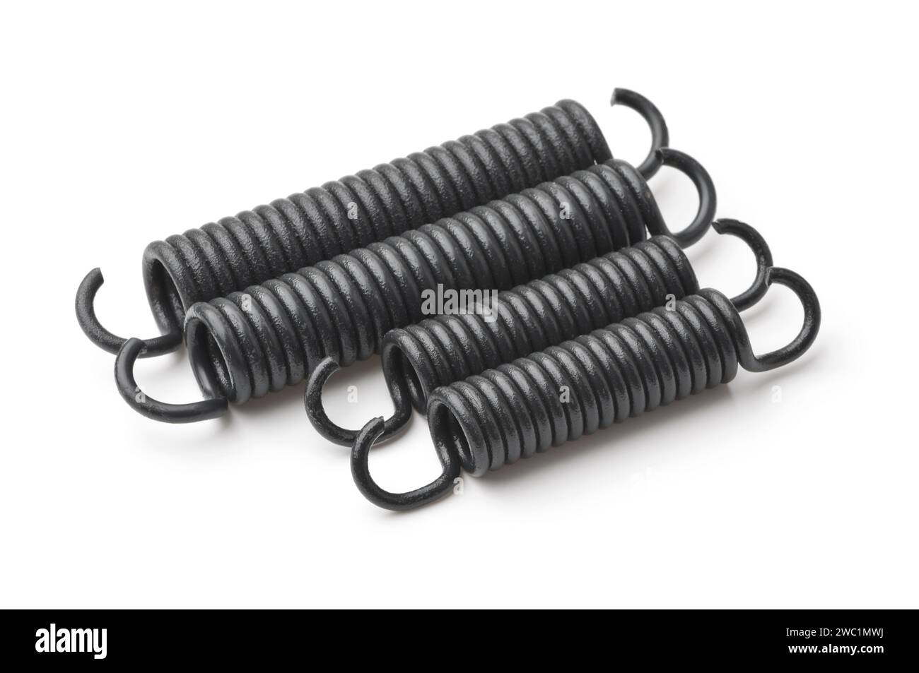 Fila di molle di tensione in metallo nero isolate su bianco Foto Stock