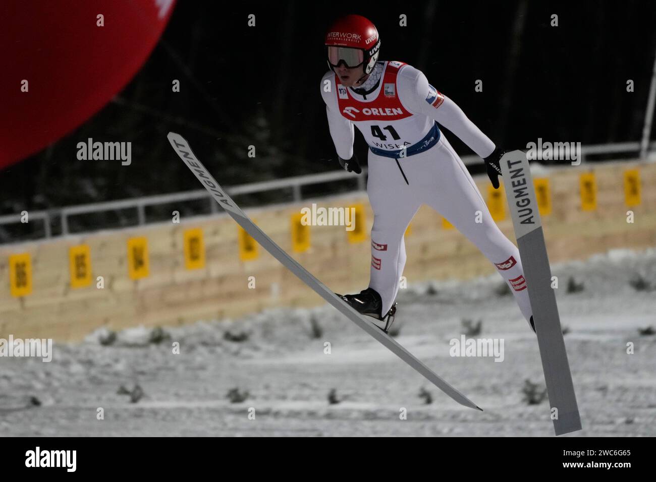 Austria's Manuel Fettner competes at the Large Hill HS134 Ski Jumping World Cup event in Wisla, Poland, Sunday, Jan. 14, 2024. (AP Photo/Czarek Sokolowski) Foto Stock