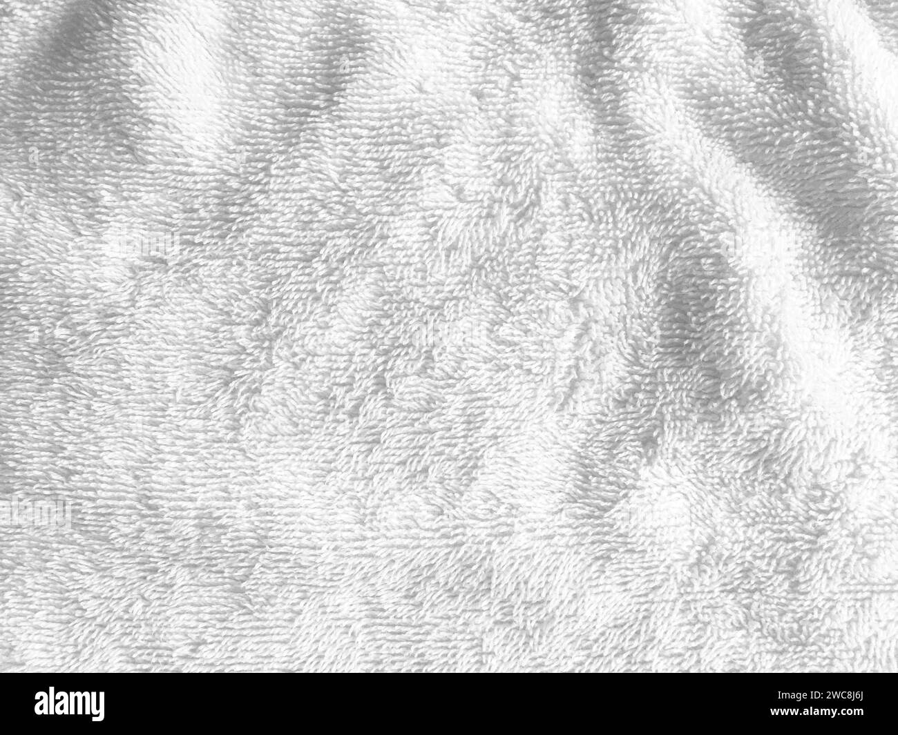 La superficie morbida e liscia del tessuto crea uno sfondo astratto e lussuoso, perfetto per un design sofisticato. Foto Stock