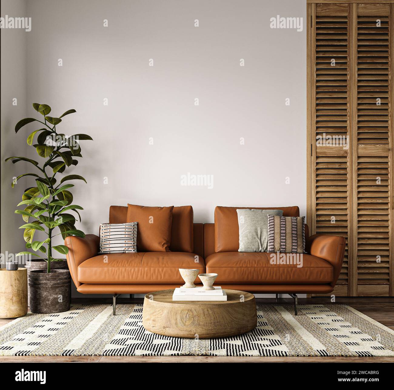 Accogliente spazio abitativo con vivace divano in pelle caramellata, tappeto eclettico e dettagli in legno naturale Foto Stock