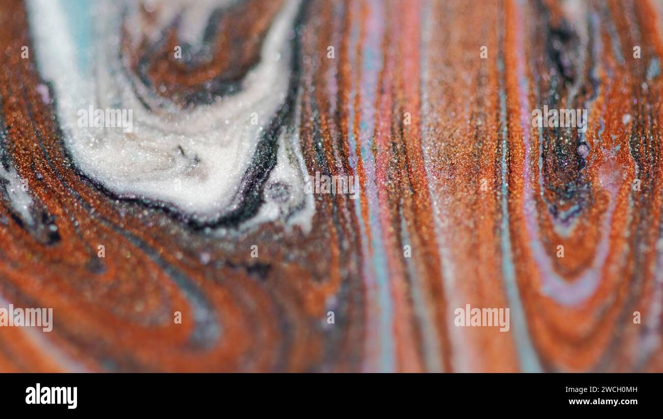 Vernice effetto glitter colore marmo inchiostro bronzo bianco Foto Stock