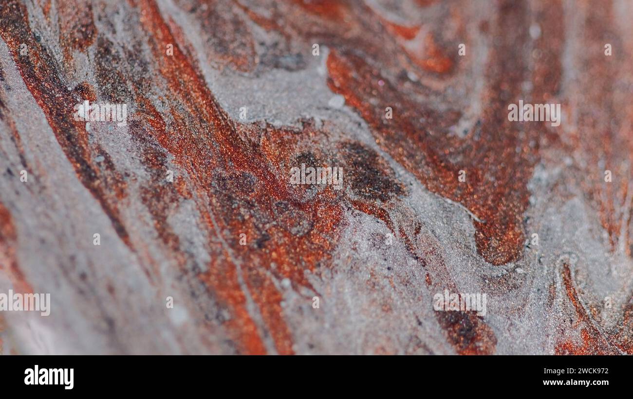 Spruzzo fluido glitter vernice marmo texture marrone Foto Stock