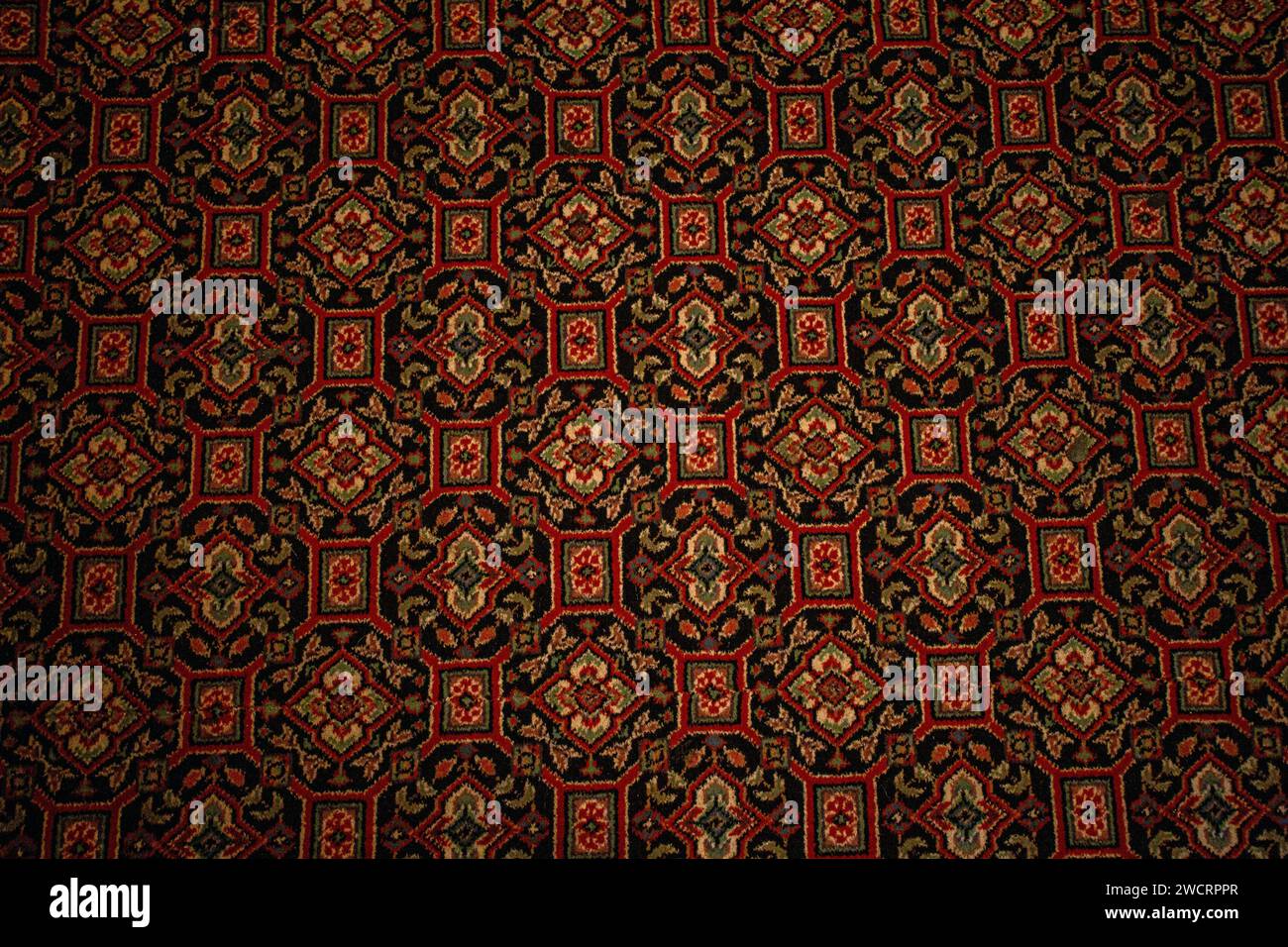 Una sezione di un classico tappeto da pub inglese nel Regno Unito Foto Stock
