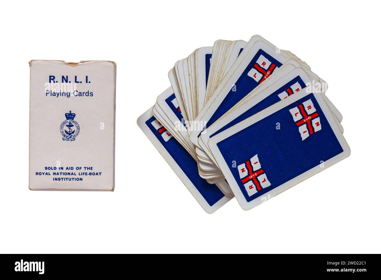 Confezione di vecchie carte da gioco RNLI rimosse dalla scatola isolata su sfondo bianco Foto Stock