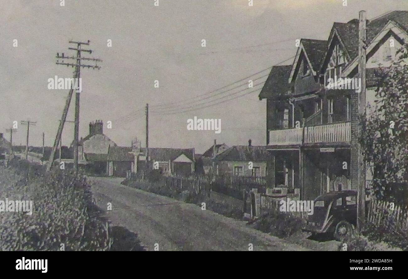 1936-03-08 guardando verso ovest lungo Mundesley Road, Trimingham. Foto Stock