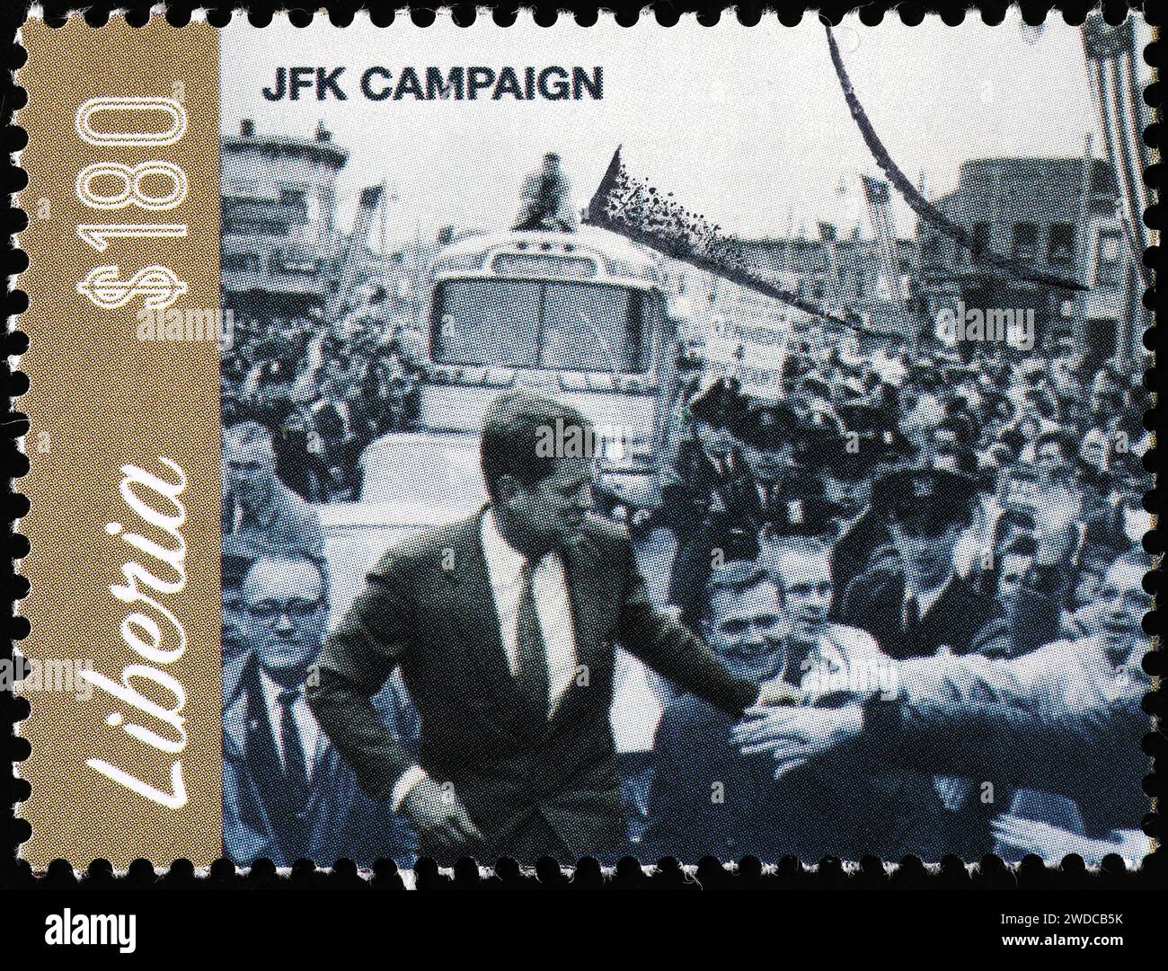 JFK durante la sua campagna per essere eletto presidente con francobollo Foto Stock