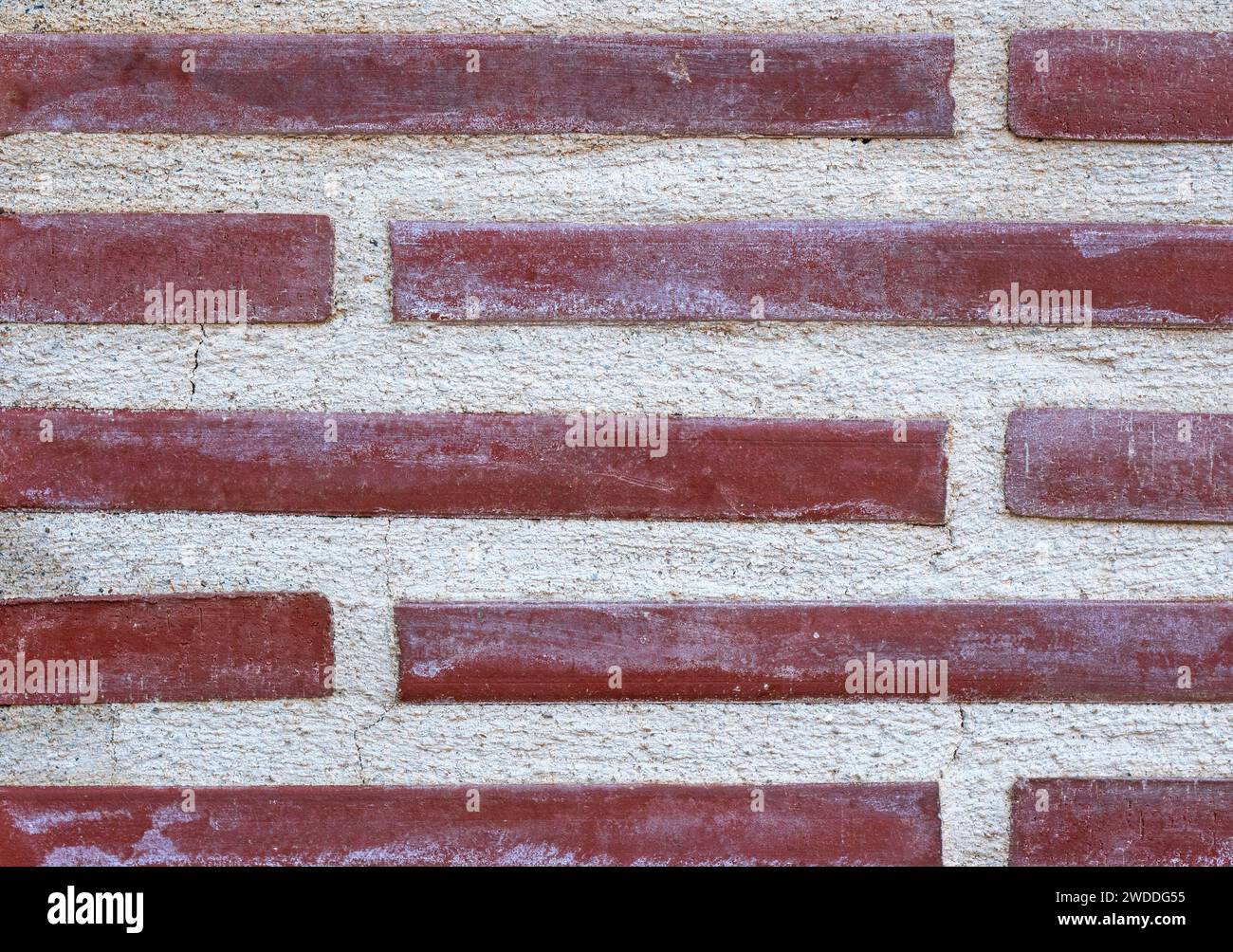 colore rosso e bianco parete in pietra, motivo e texture. labirinto, concetto. parte dell'edificio. Foto Stock