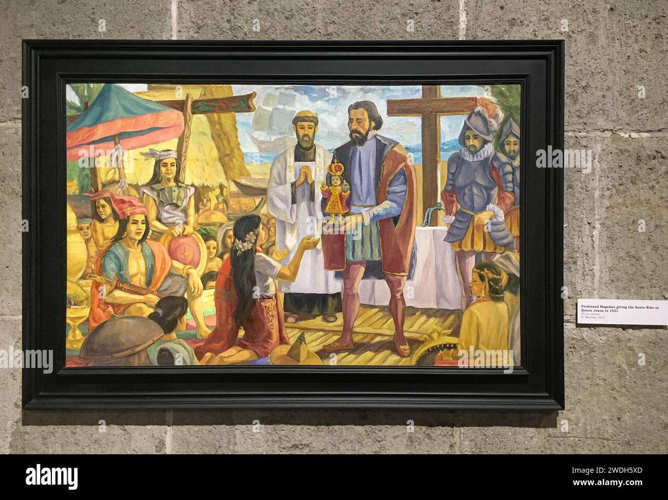 Manila, Filippine. 21 gennaio 2024: Pittura nella chiesa e monastero di San Agustin a Intramuros, il quartiere più antico delle mura. La festa di sto. Nino de tondo (Lakbayaw) e Santo Nino de Pandacan sono celebrati nelle due parrocchie di Manila ogni terza domenica di gennaio. Oggi, i devoti porteranno le loro statue o immagini del bambino Gesù e si uniranno a una processione in onore del Santo bambino. La devozione, anch'essa un grande evento a Cebu (Sinulog), ebbe origine più di 500 anni fa, quando Magellano sbarcò nell'arcipelago nel 1519 e portò un'immagine del bambino Gesù Cristo. Crediti: Kevin Izorce/Alamy Live News Foto Stock Manila, Filippine. 21 gennaio 2024: Pittura nella chiesa e monastero di San Agustin a Intramuros, il quartiere più antico delle mura. La festa di sto. Nino de tondo (Lakbayaw) e Santo Nino de Pandacan sono celebrati nelle due parrocchie di Manila ogni terza domenica di gennaio. Oggi, i devoti porteranno le loro statue o immagini del bambino Gesù e si uniranno a una processione in onore del Santo bambino. La devozione, anch'essa un grande evento a Cebu (Sinulog), ebbe origine più di 500 anni fa, quando Magellano sbarcò nell'arcipelago nel 1519 e portò un'immagine del bambino Gesù Cristo. Crediti: Kevin Izorce/Alamy Live News Foto Stock
