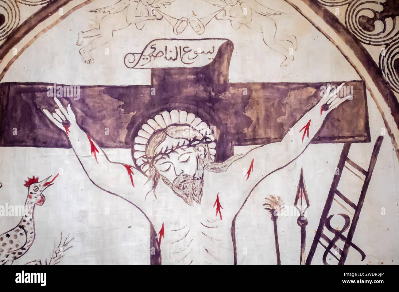 La Crocifissione di Cristo, 1907, stampa Woodcut con pittura a mano su tessuto di cotone, Mardin 40 Martyrs Church, Turchia. Frammento Foto Stock
