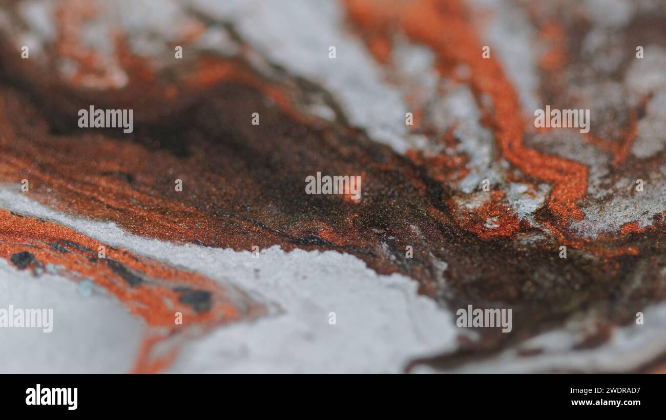 Spruzzo fluido glitter vernice marmo texture marrone Foto Stock