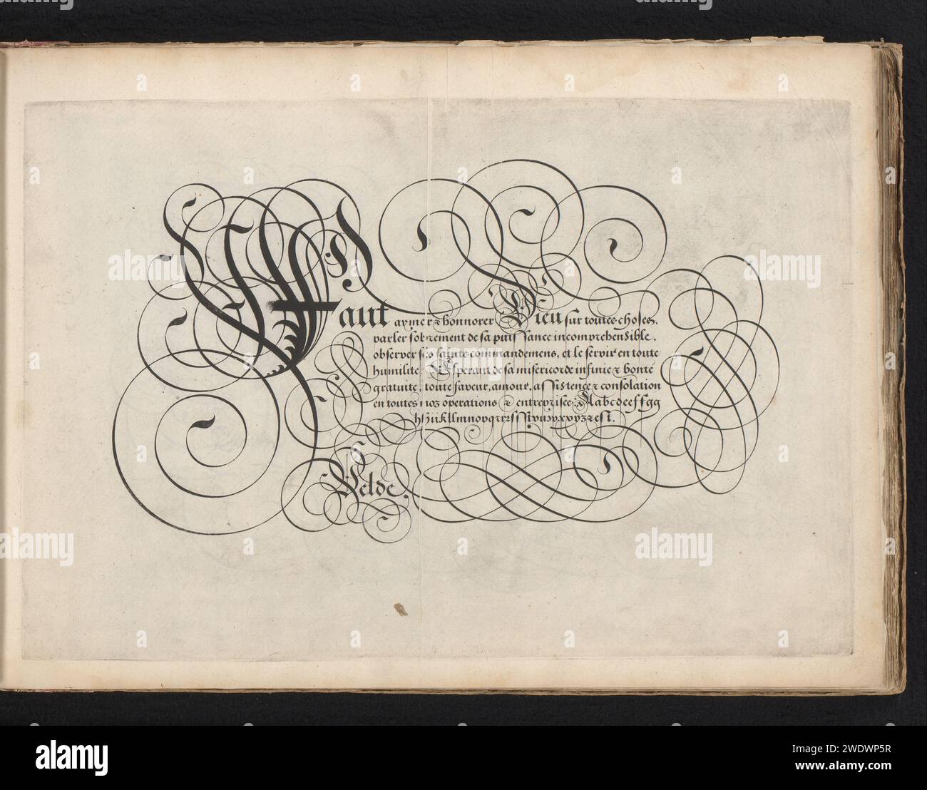 Esempio di scrittura: Faut Aymer (...), Simon Frisius, 1608 print write example with ornamented initial f and Seven lines Text: Faut Aymer ... nella parte inferiore di un alfabeto calco inferiore nella mano in questione. Il testo è incorniciato da arricciatura. La stampa fa parte di un album. Incisione su carta di Amsterdam calligrafia Foto Stock