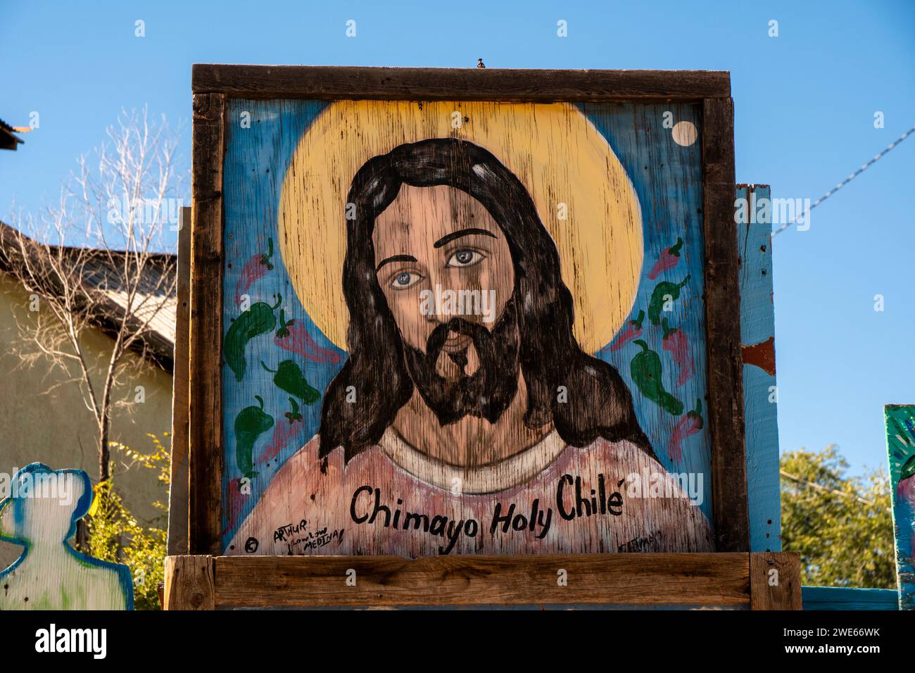 Cartello auto-promozionale per Arthur Medina, situato di fronte al Santuario de Chimayo, a Chimayo, New Mexico Foto Stock