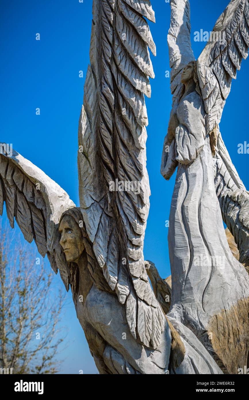 Angel Tree Carving di Dayle Lewis sulla spiaggia di Bay St Louis, Mississippi Foto Stock