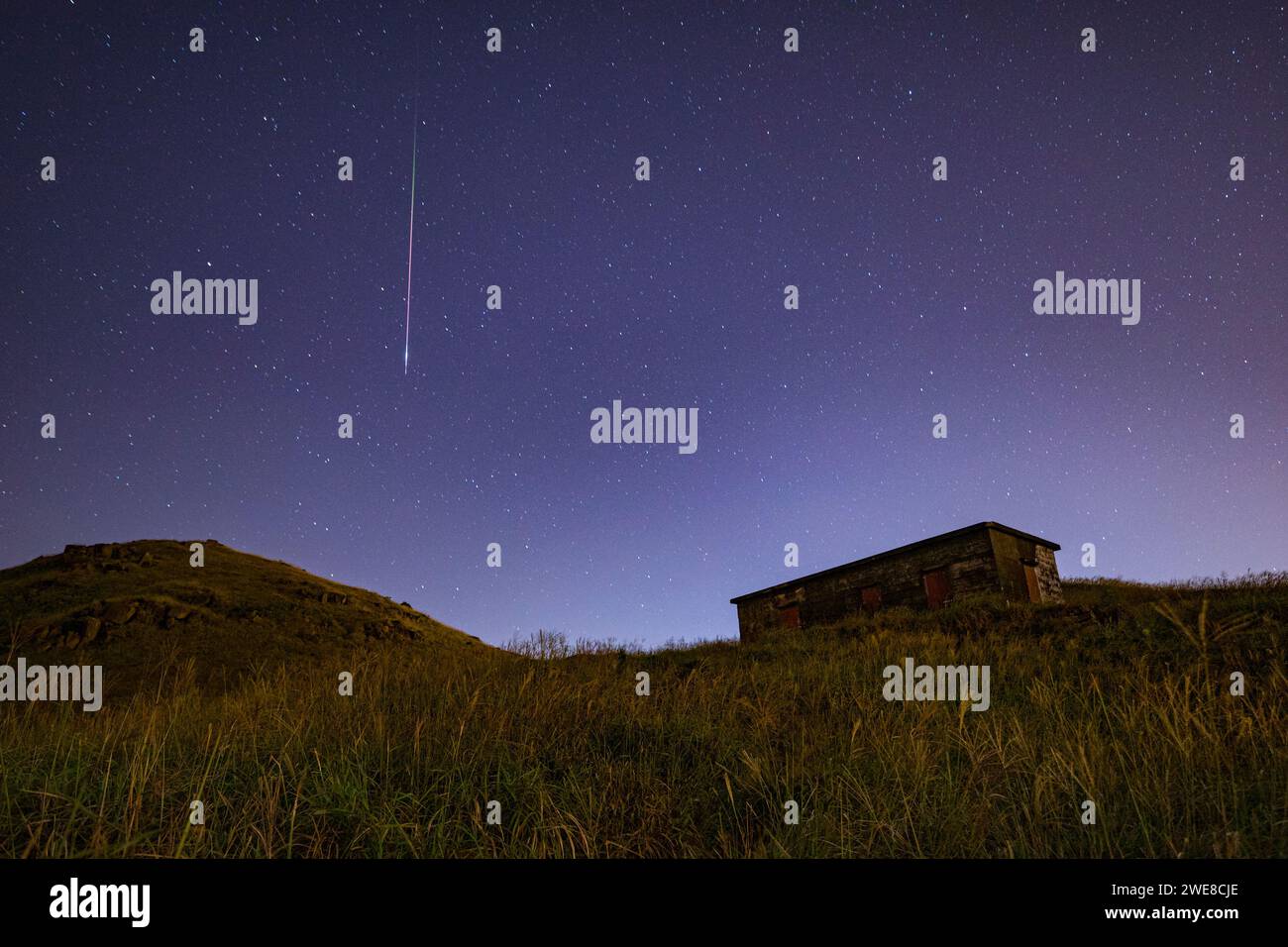 Serenata di mezzanotte sotto Un cielo stellato - cabina isolata e Una Stella di tiro Foto Stock