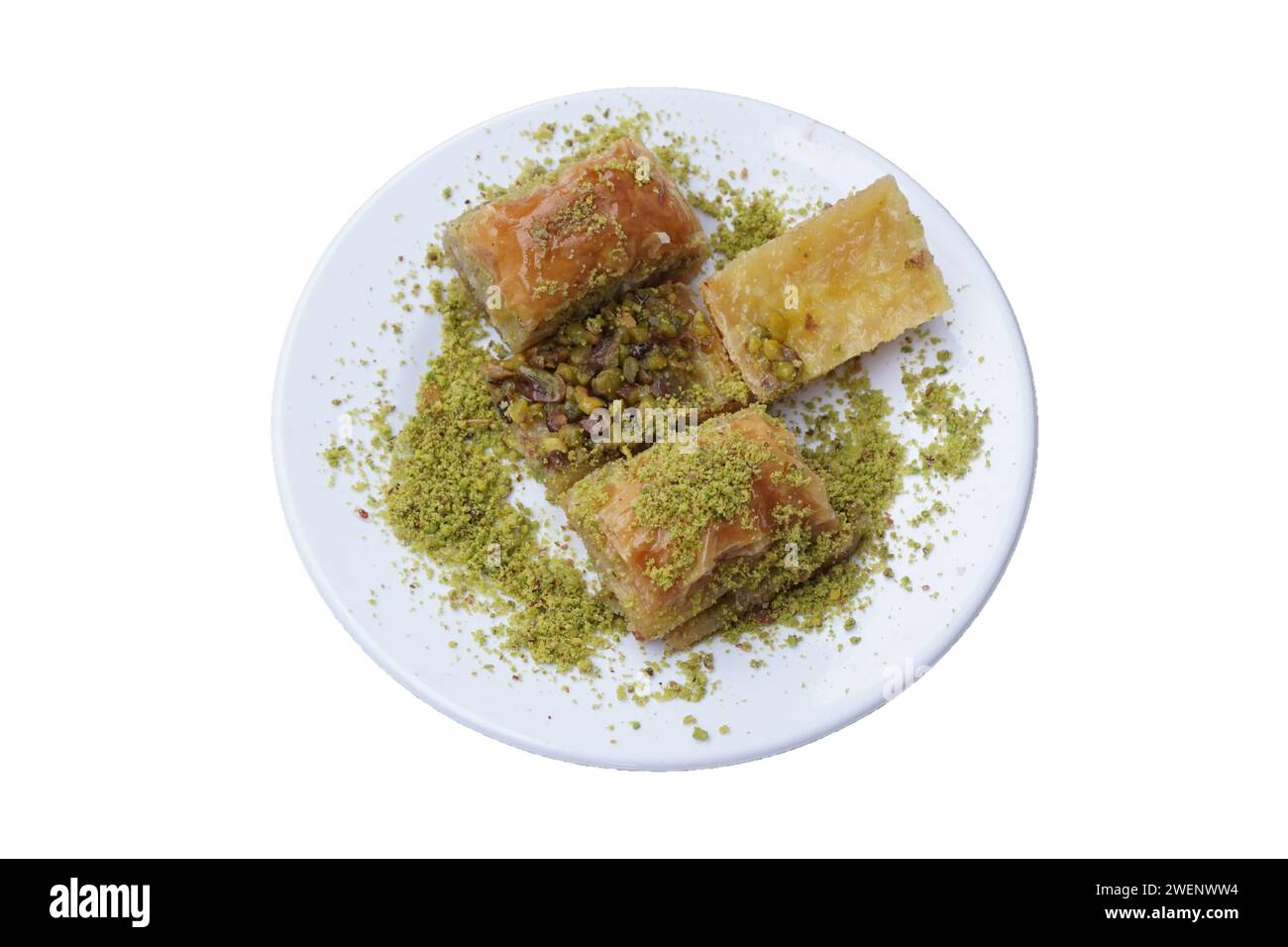 Baklava con pistacchi, delizioso dessert turco tradizionale, isolato Foto Stock