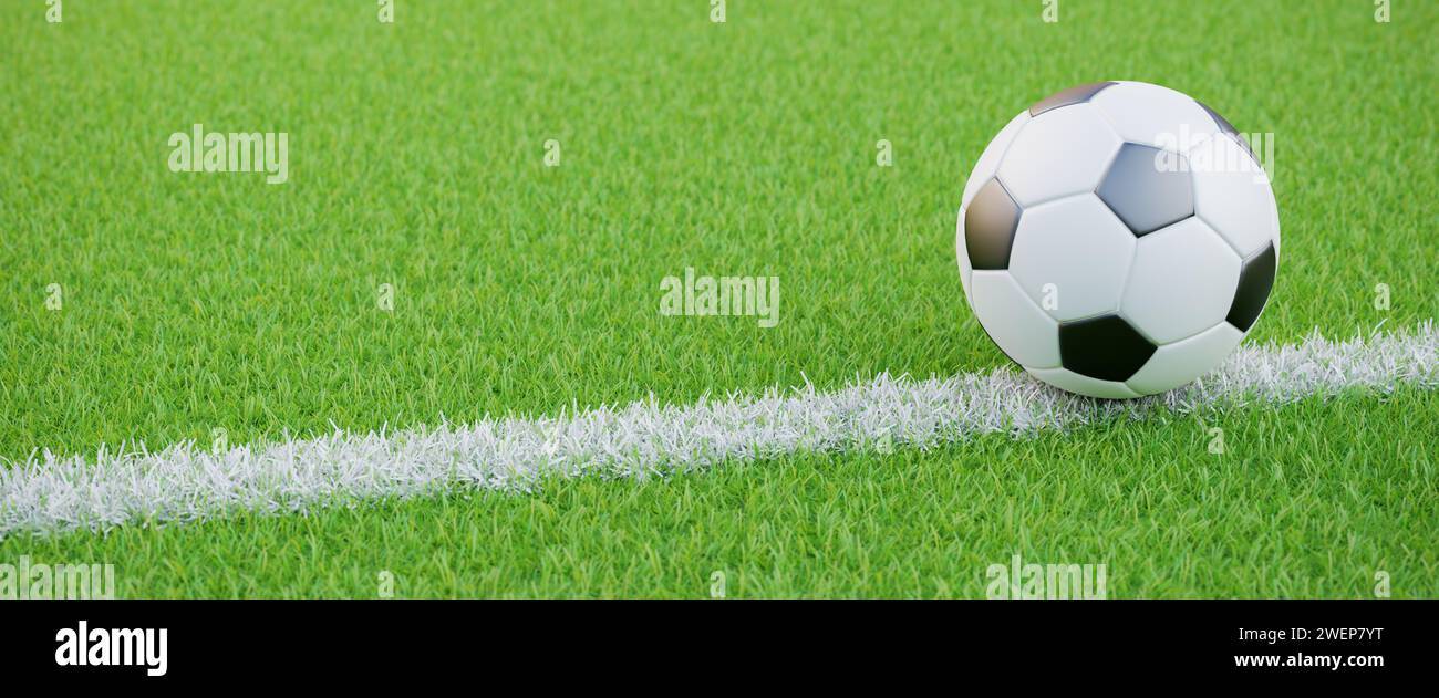 Gesso su un campo in erba con una palla da calcio. formato banner web con spazio di copia Foto Stock