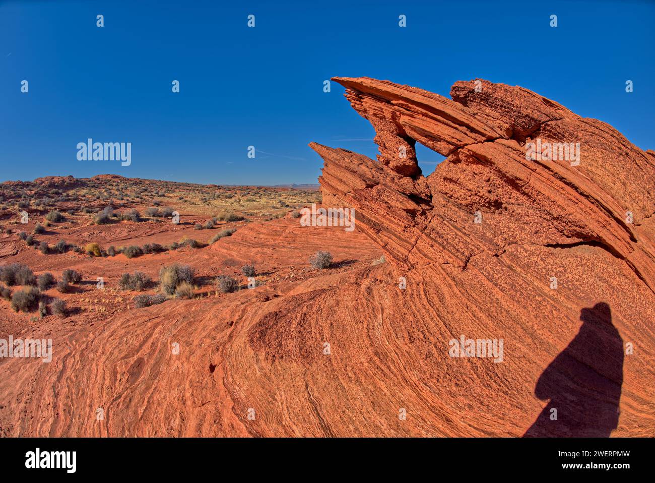 Un arco di forma triangolare nello Spur Canyon a nord di Horseshoe Bend vicino a Page Arizona. Foto Stock