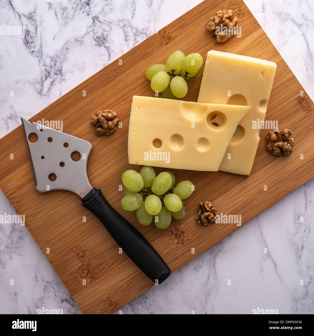 Formaggio, noci e uva Foto Stock