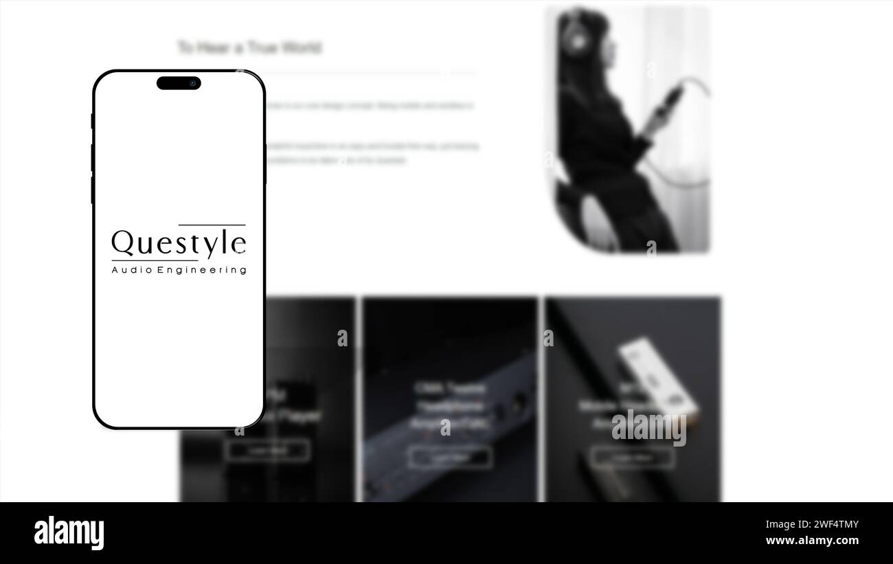 Istanbul, Turchia - 25 gennaio 2024: Logo del marchio Questyle sullo schermo dello smartphone con il sito Web Questyle sullo sfondo. Questyle e' una compagnia audio di alto livello Foto Stock