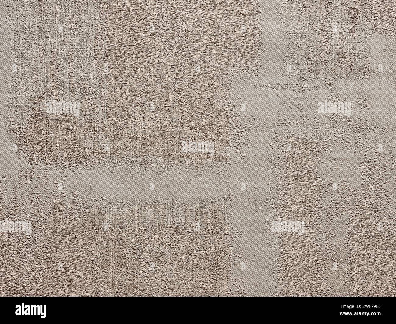 Sfondo o sfondo beige testurizzato astratto. Carta da parati in materiale senza cuciture con un look vintage ruvido, resistente agli agenti atmosferici e grunge. Carta design vintage par Foto Stock