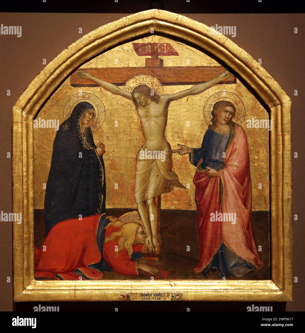 The Crucifizion, 1390 ca. Di angolo Gaddi. Tempera e oro sul pannello. Museo Thyssen. Madrid. Spagna. Foto Stock