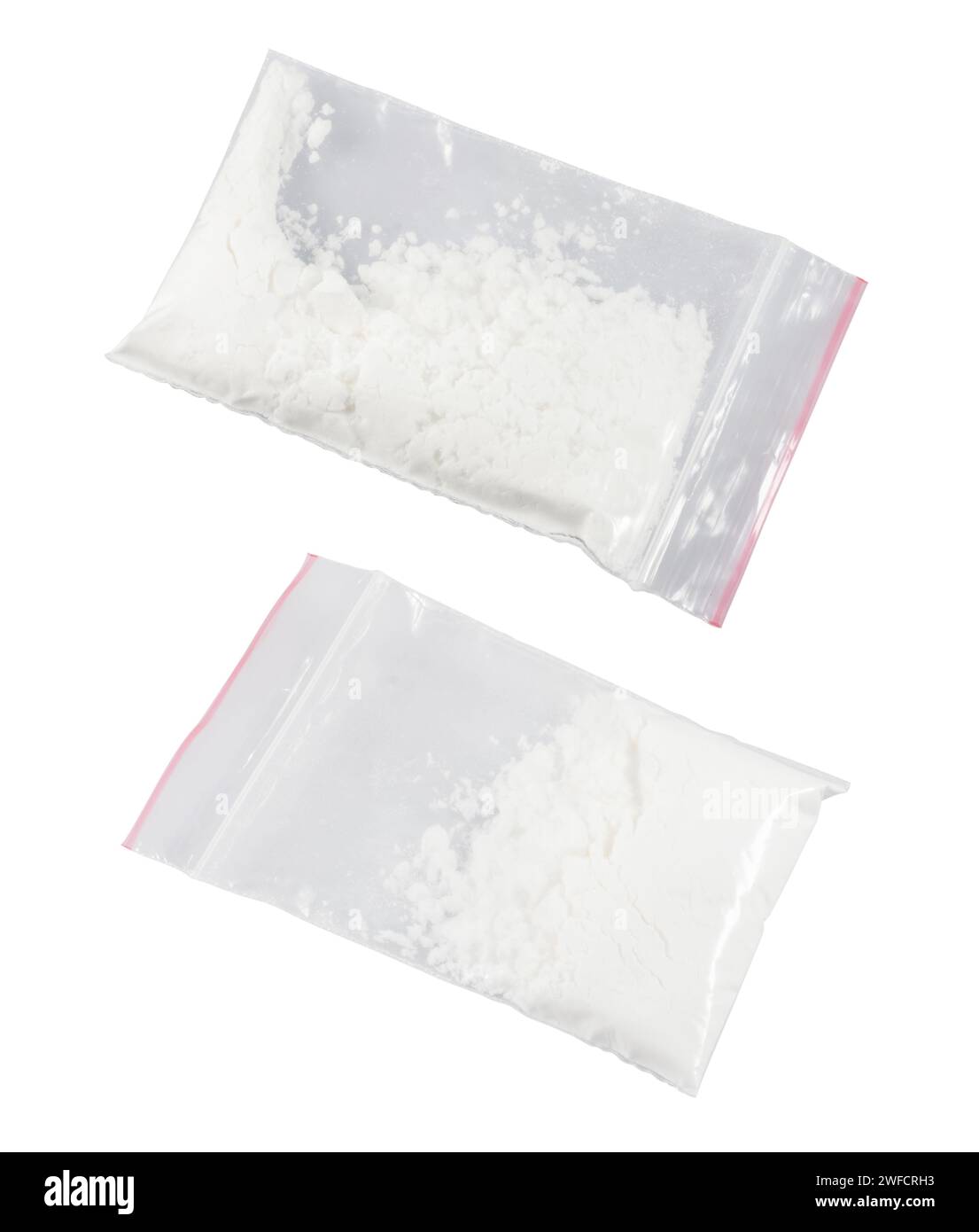 Cocaina in confezione di plastica su sfondo bianco. Foto Stock
