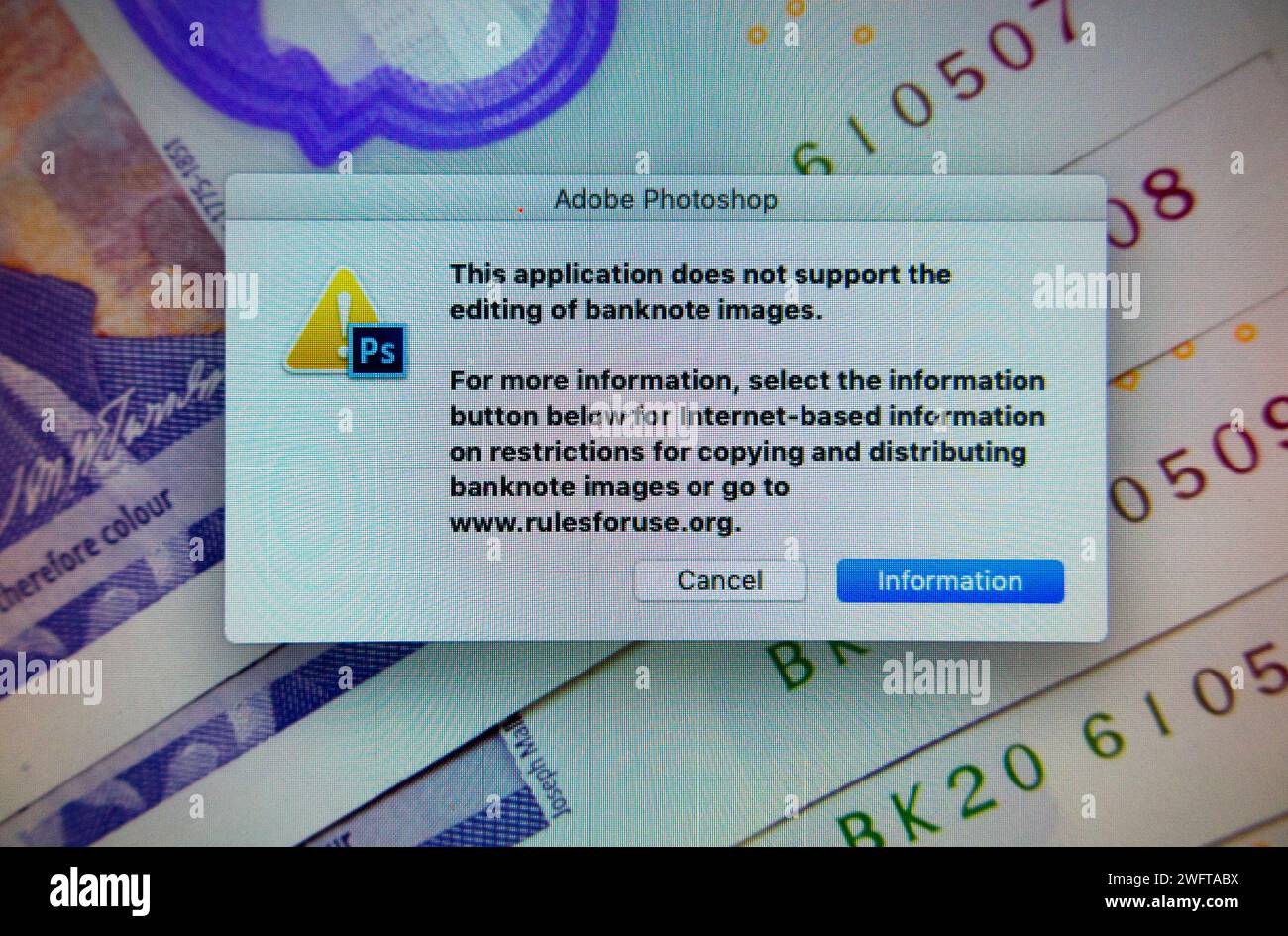 Finestra di dialogo Adobe Photoshop che indica che le immagini delle banconote/sterline britanniche sono soggette a restrizioni e non possono essere elaborate tramite software. (137) Foto Stock