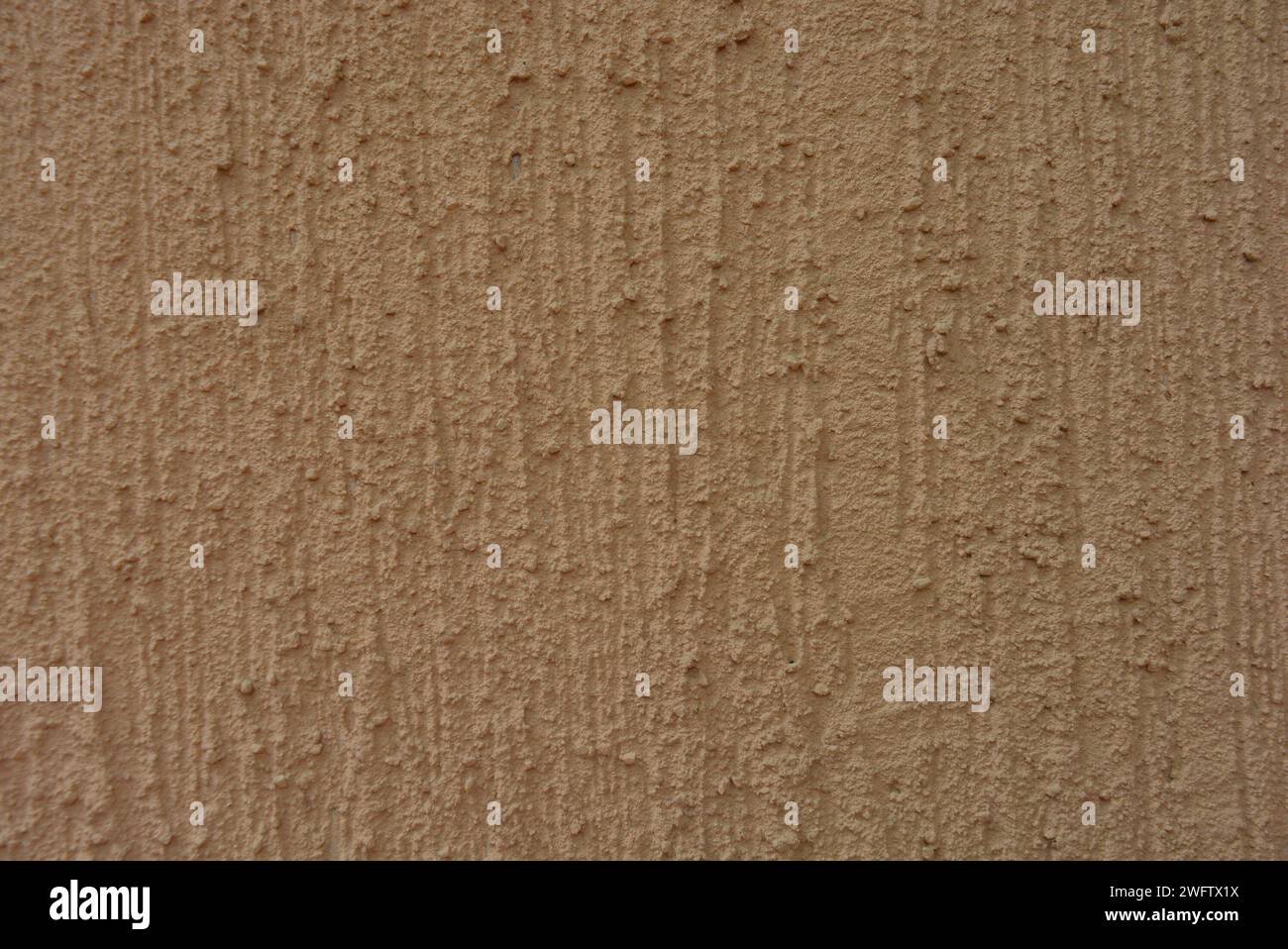 Intonaco strutturale marrone, betle corteccia per la costruzione di vernice per decorazione esterna. Foto Stock