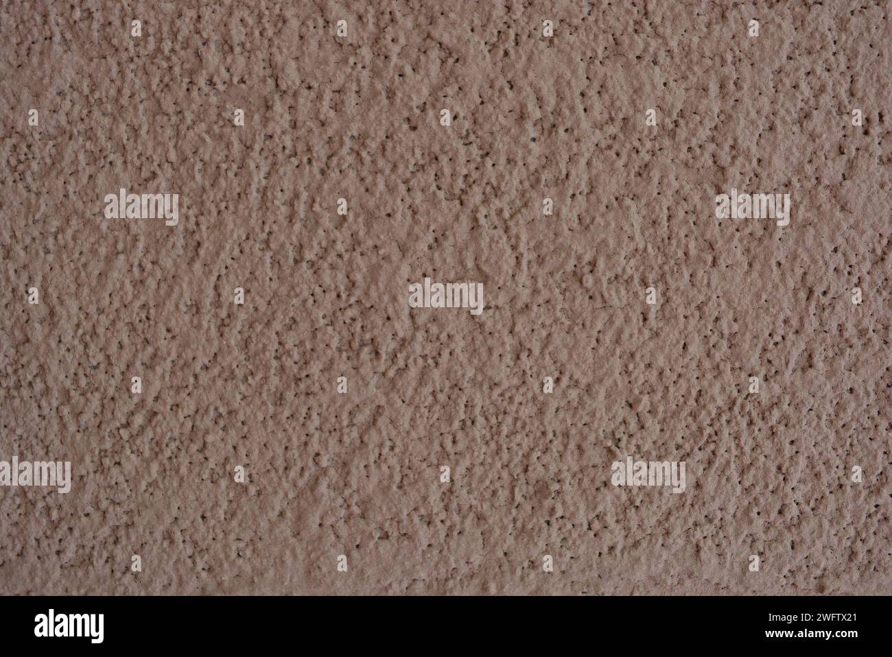 Intonaco strutturale marrone, betle corteccia per la costruzione di vernice per decorazione esterna. Foto Stock