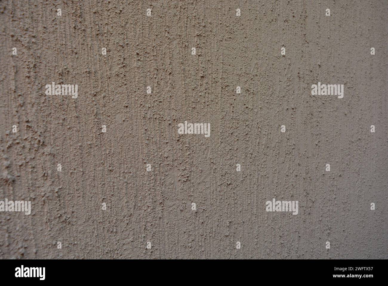 Intonaco strutturale marrone, betle corteccia per la costruzione di vernice per decorazione esterna. Foto Stock