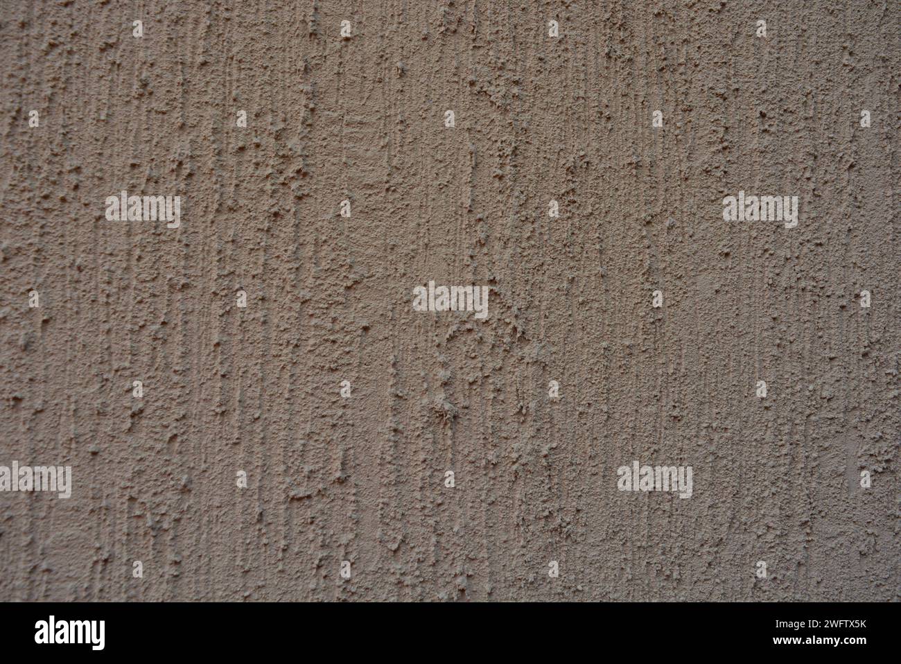 Intonaco strutturale marrone, betle corteccia per la costruzione di vernice per decorazione esterna. Foto Stock
