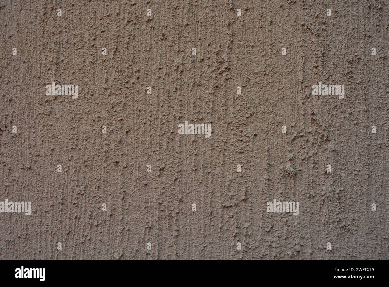 Intonaco strutturale marrone, betle corteccia per la costruzione di vernice per decorazione esterna. Foto Stock