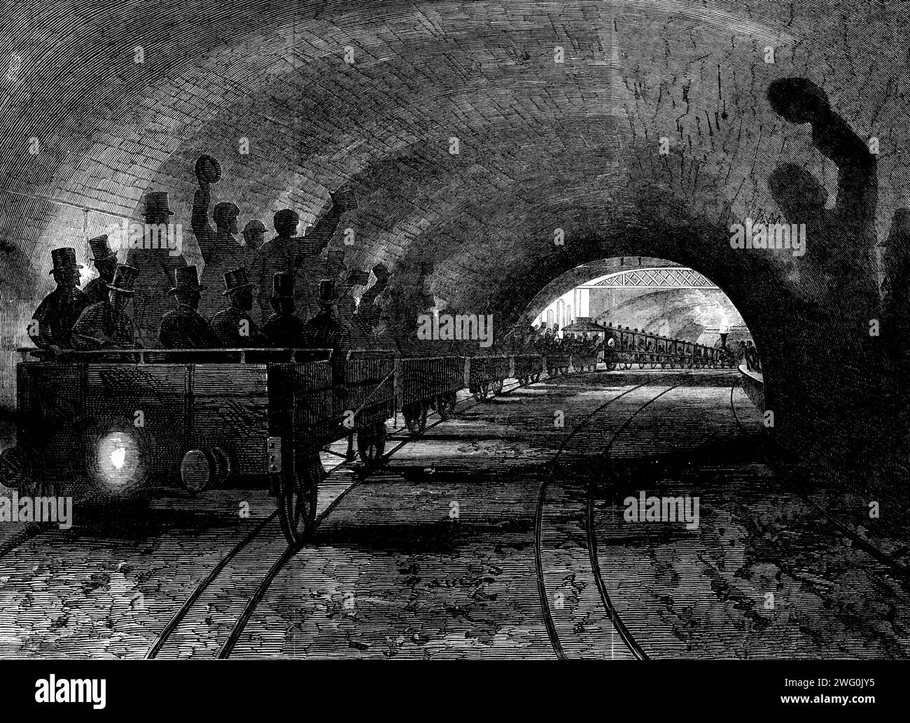 Trial-trip sulla Metropolitan (Underground) Railway: Il treno che passa per la stazione Portland-Road, [Londra], 1862. "Questa ferrovia... è stata annoiata con successo in mezzo a una complicata rete di gaspipes, tubi d'acqua e fognature, da Paddington a Victoria-Street... Un gran numero di azionisti, insieme ai membri della sacrestia di St. Pancras, e i rappresentanti di altre parrocchie attraverso le quali passa la linea, sono stati trasmessi il sabato settimana sulla linea, e l'aspetto dei lavori è stato tale da dare soddisfazione a tutte le parti interessate a questa grande impresa. La Foto Stock