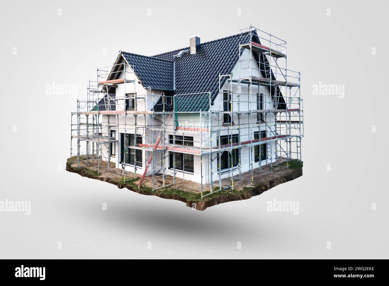 Il concetto creativo di una casa galleggiante per una sola famiglia in costruzione Foto Stock